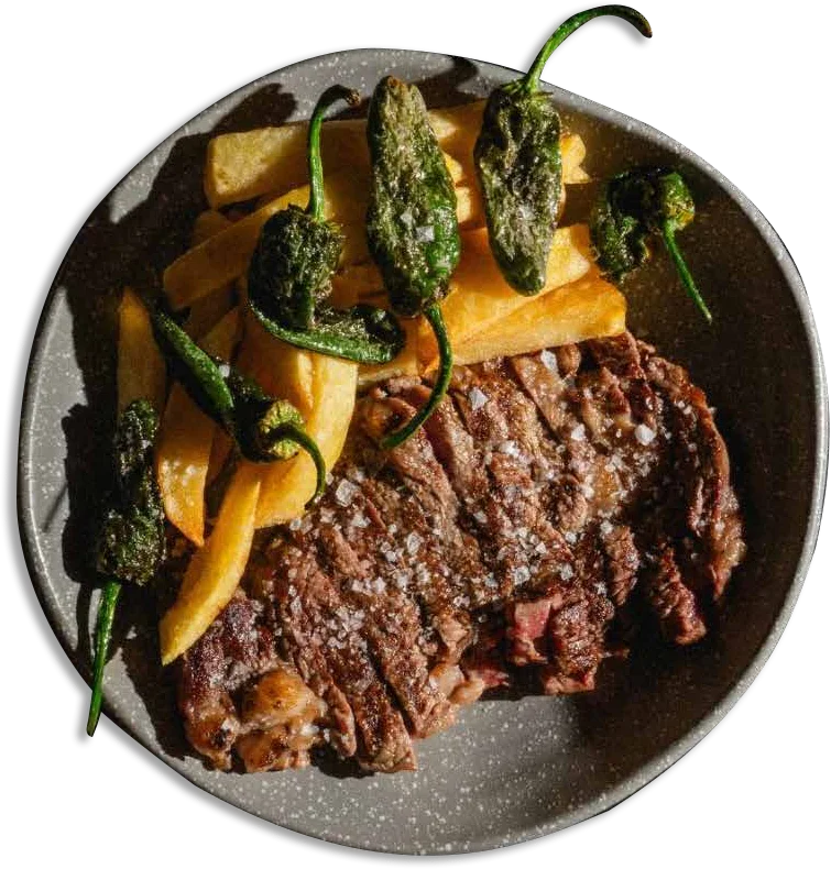 Entrecote a la brasa con pimientos